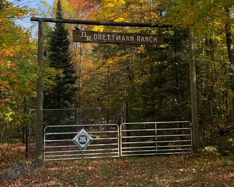The Drettman Ranch sign over entrance gates at the ranch enclosure